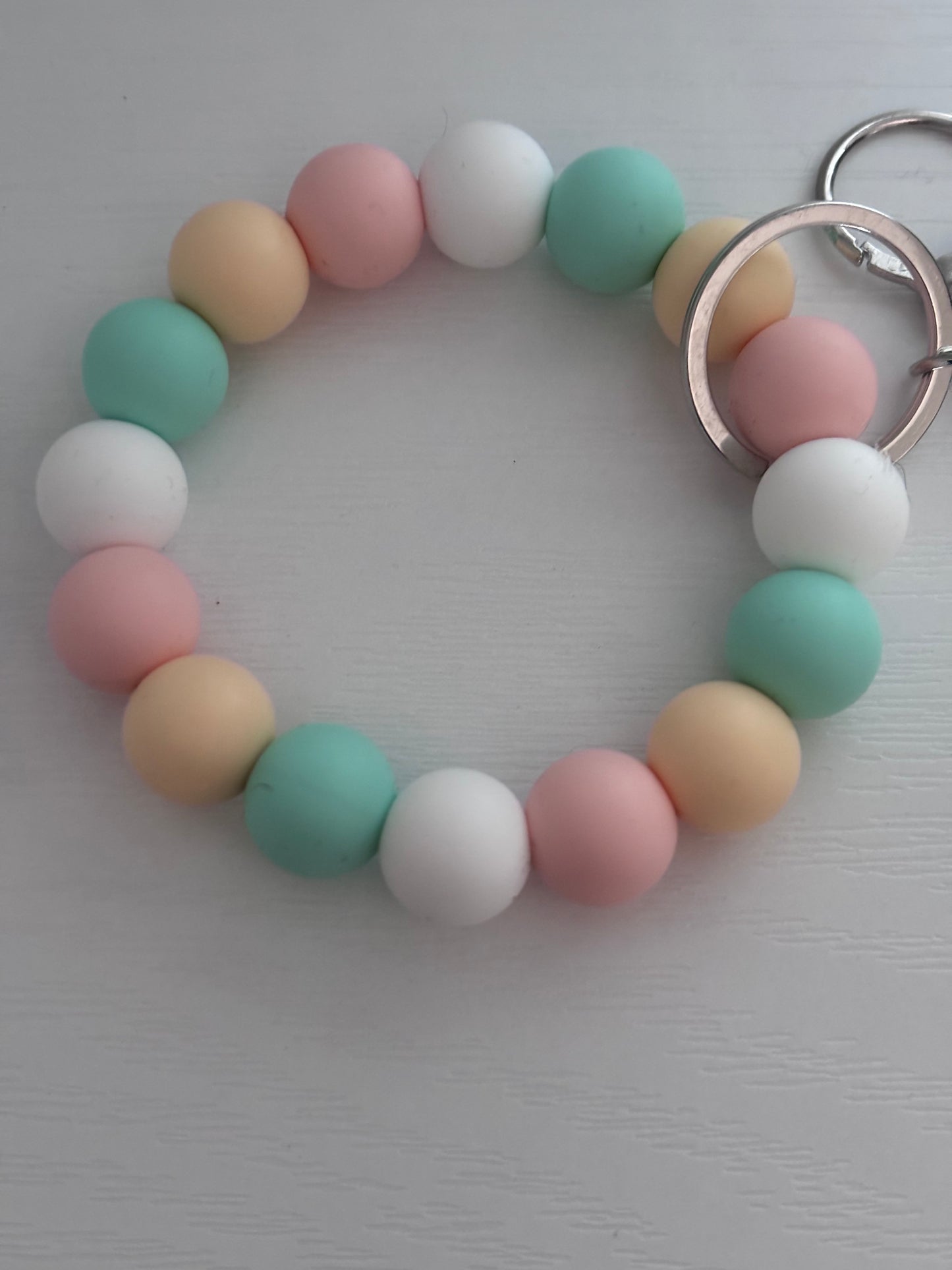 Hand‑Beaded Wristlet Keyring | Pastel Peach, Pink, Mint & White with Sun Charm