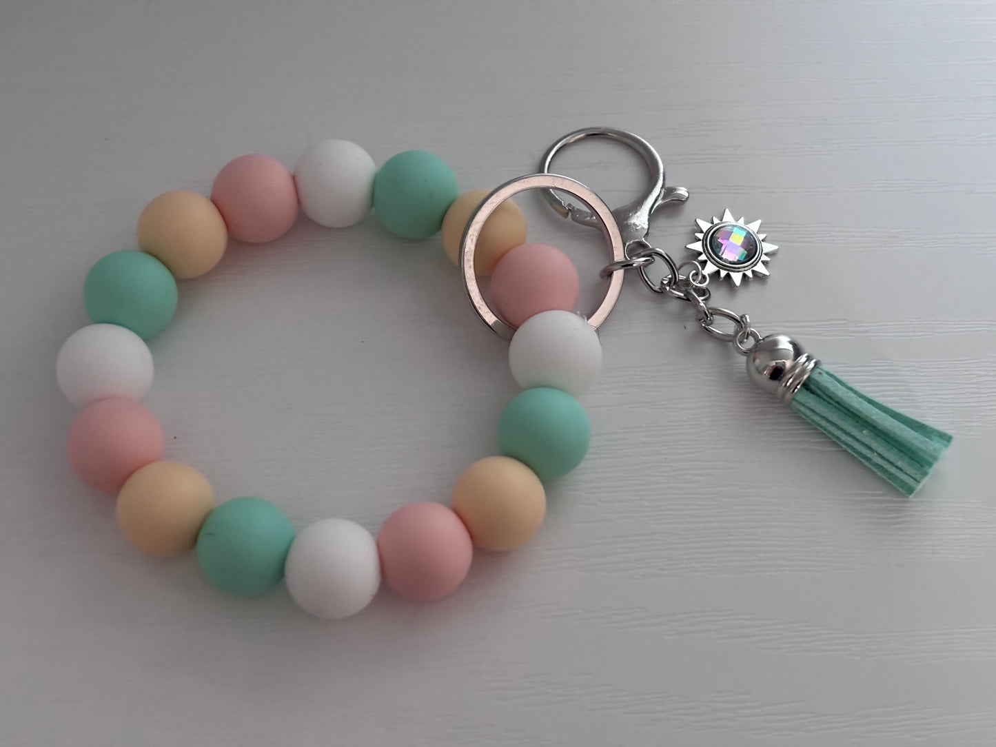 Hand‑Beaded Wristlet Keyring | Pastel Peach, Pink, Mint & White with Sun Charm
