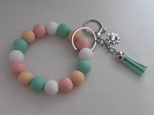 Hand‑Beaded Wristlet Keyring | Pastel Peach, Pink, Mint & White with Sun Charm