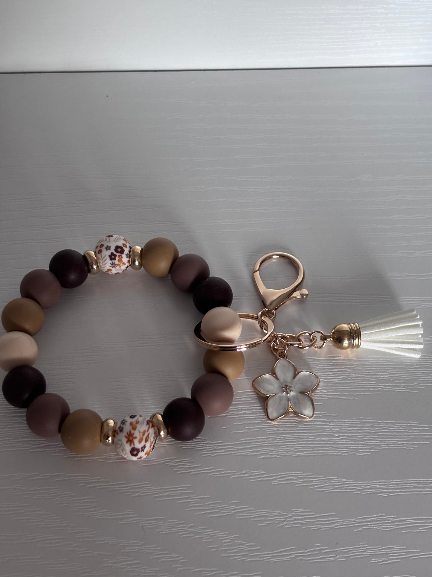 Hand‑Beaded Wristlet Keyring | Warm Neutrals & Floral Print with White Flower Charm