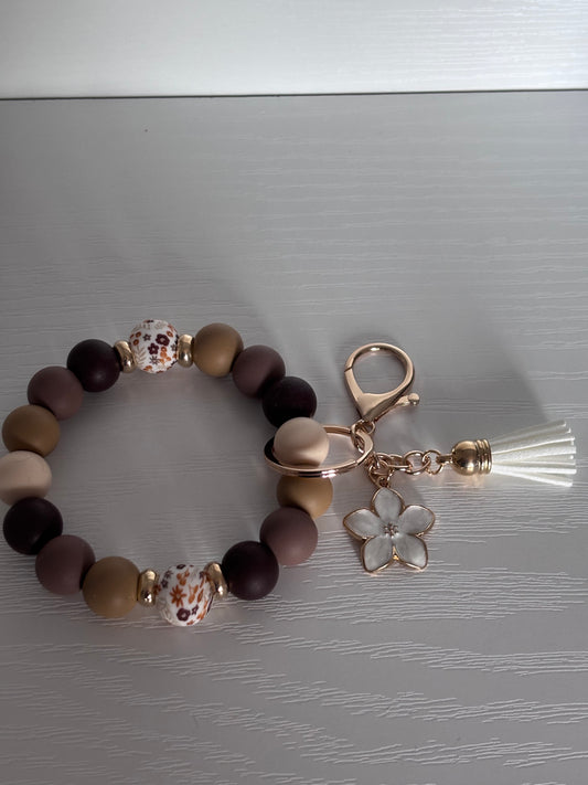Hand‑Beaded Wristlet Keyring | Warm Neutrals & Floral Print with White Flower Charm