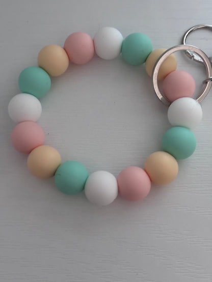 Hand‑Beaded Wristlet Keyring | Pastel Peach, Pink, Mint & White with Sun Charm