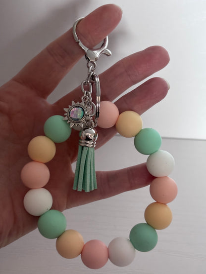 Hand‑Beaded Wristlet Keyring | Pastel Peach, Pink, Mint & White with Sun Charm